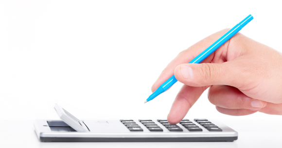 Budgeting for condo corporation expenses using a calculator – Larlyn Property Management.