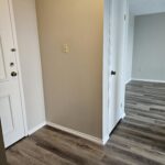 Freshly painted hallways in a 2-bedroom apartment at 600 Grenfell Drive.