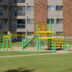 A playground outside of Fairways, a residential property managed by Larlyn.
