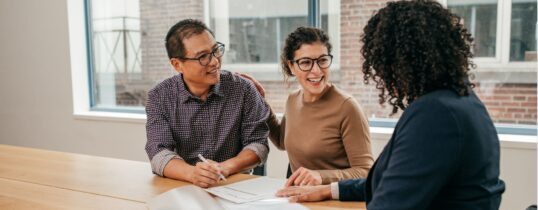 Man and woman meeting a property manager