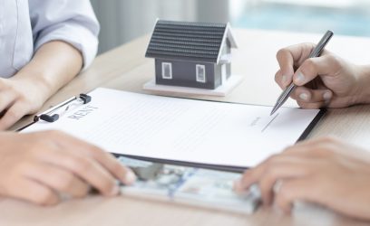 Landlord and tenant going over legal requirements for a rental agreement in Alberta.