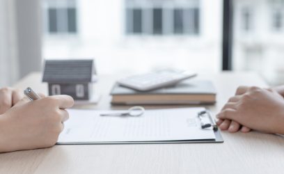 Landlord and tenant going over legal requirements for a rental agreement in Ontario.