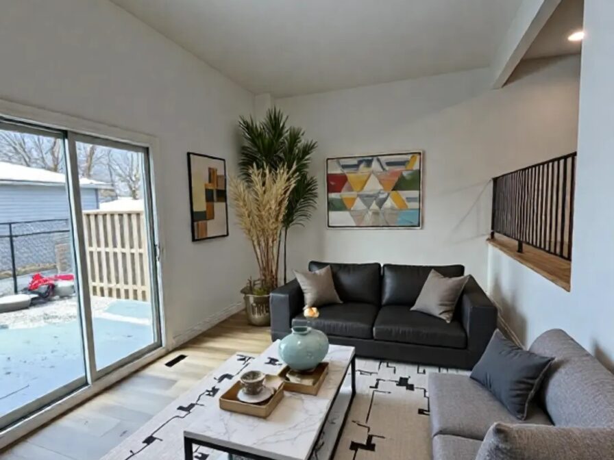 staged living room in 3-bedroom townhome for rent in Brantford, ON