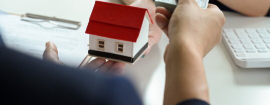 Property manager going over strategies to enhance ROI for real estate investors