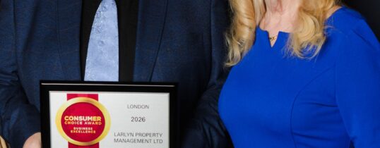 Text Larlyn Property Management team members receiving the Consumers Choice Award for 2026